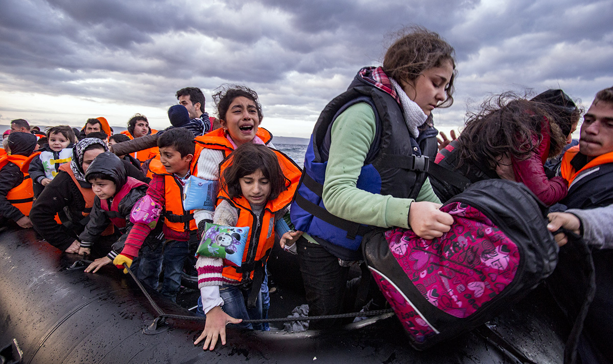 Migranter vid den grekiska ön Lesbos. Licens: Shutterstock.com
