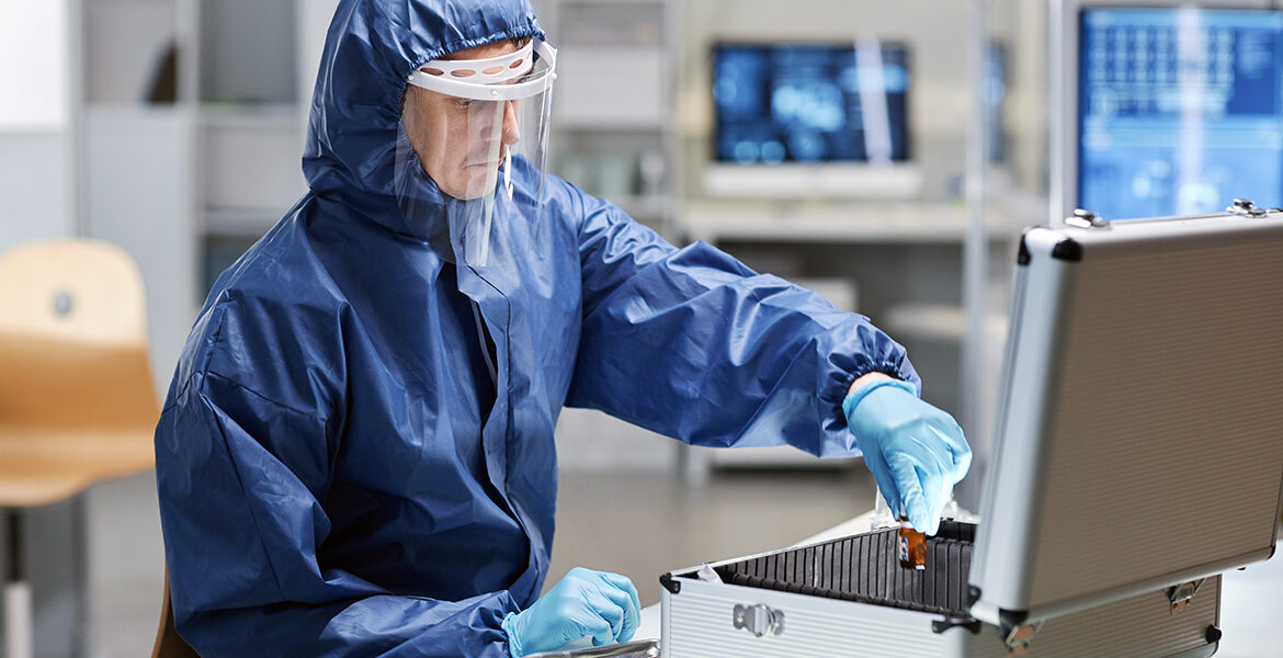 Researcher wearing protective bio suit in a laboratory