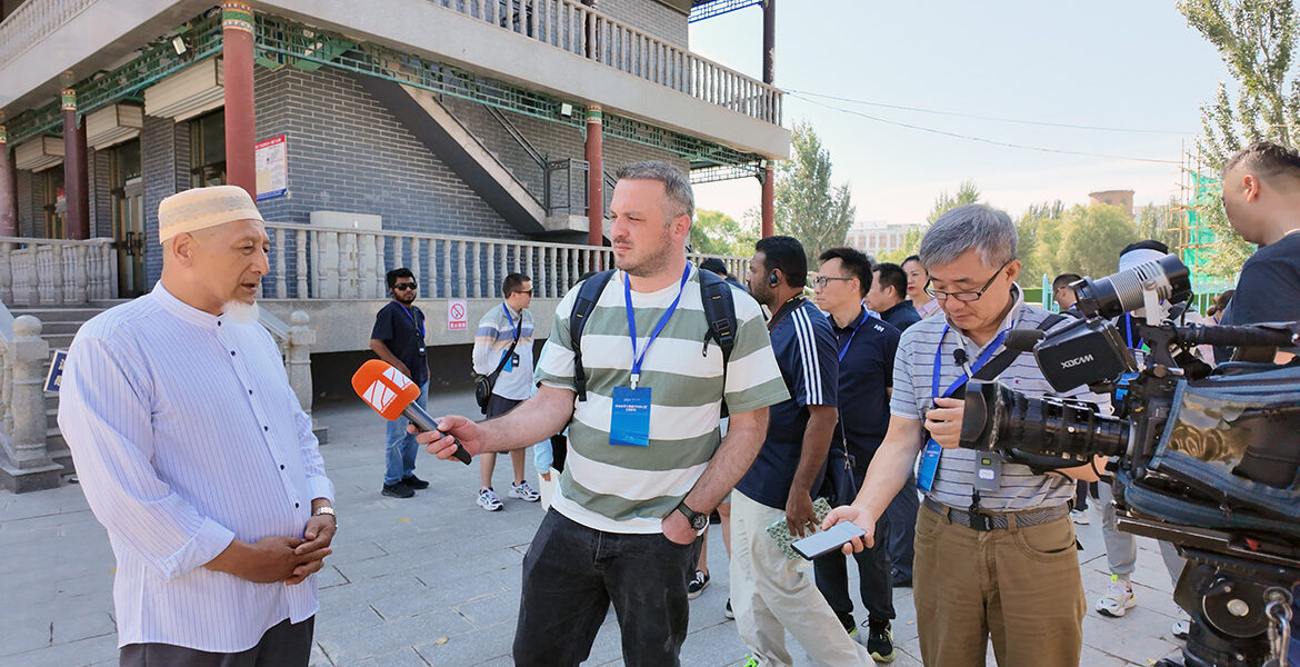 Reporters in Xinjiang