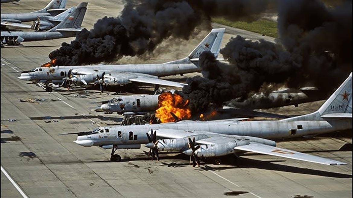 Russian nuclear bombers are burning after an Ukrainian attack, June 1, 2025.