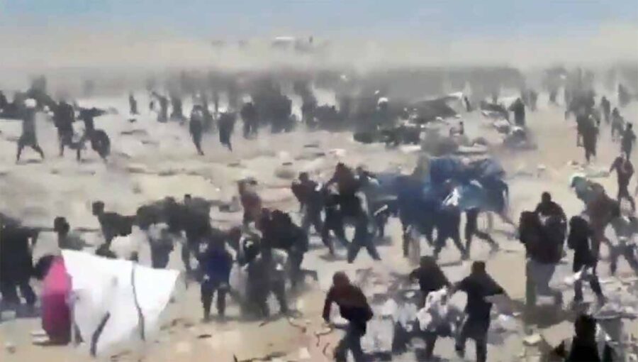 Thousands of Palestinians run to get food aid while Israeli soldiers shoot at them in Gaza July-August 2025. Private footage
