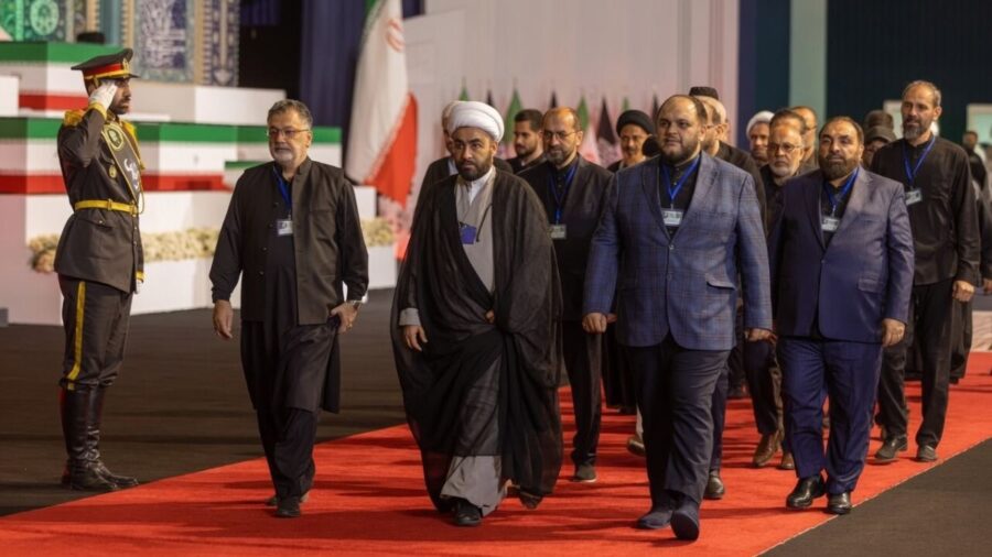 Foreign dignitaries and officials walk in procession during the Khamenei funeral ceremonies in Tehran
